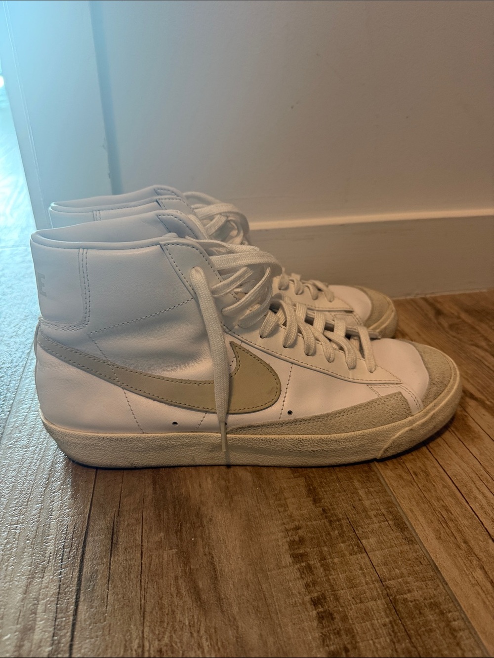 Nike High-Top Sneakers in White with Beige Swoosh